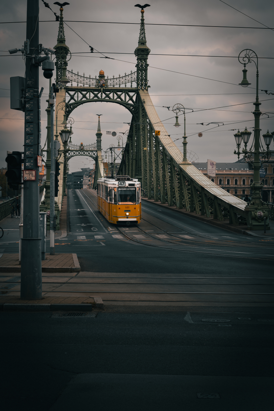 Yellow Tram Under Grey Skies